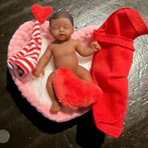 My mini baby zuru
Heart themed 
Dark skin